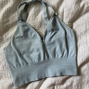 FREEPEOPLE ACTIVE DISTRESSED WASH ACTIVE TOP BLUE CROSS BACK SIZE M/L